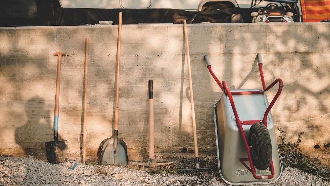 Compact wall storage for garden hand tools